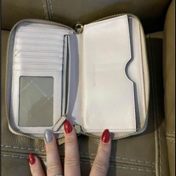 Michael Kors pink pebbles leather wristlet. - Picture 5 of 5